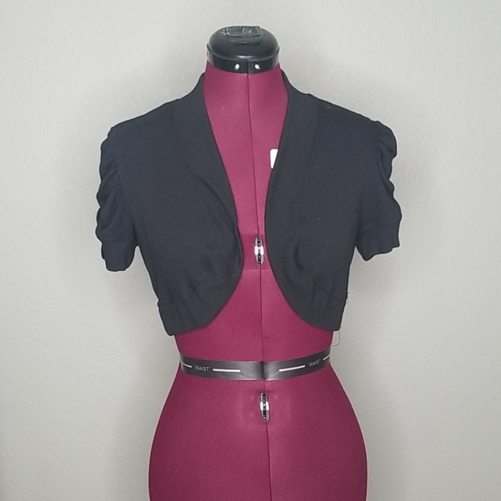 Black shrug